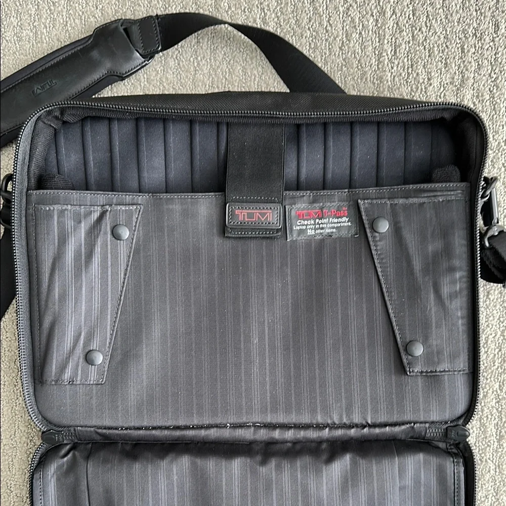 Tumi Black Briefcase with Durable Nylon and Adjustable Strap